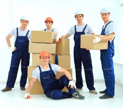 Professional movers packing and loading household items for a Tottenham relocation