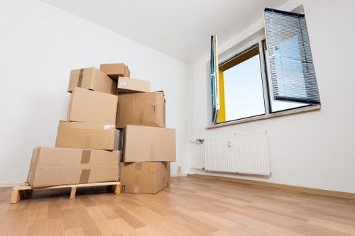 Packed office equipment ready for transport during a Tottenham relocation
