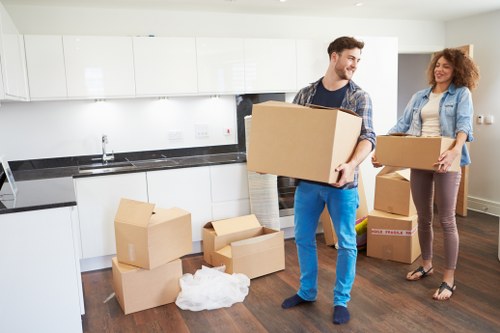 Moving house planning in Tottenham with boxes and a removal van