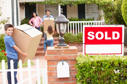 Loading household furniture into a removal van