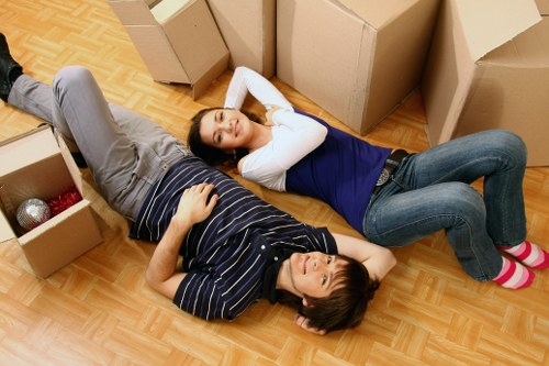 Removal team loading boxes and furniture for a Tottenham house move