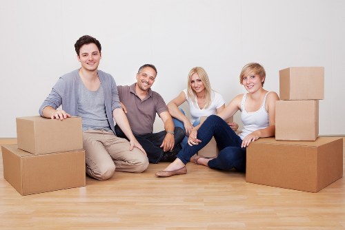 Packed moving boxes and furniture ready for transport